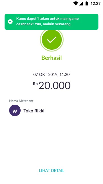 Payment success screen with a green toast: the user got a token to play the cashback game